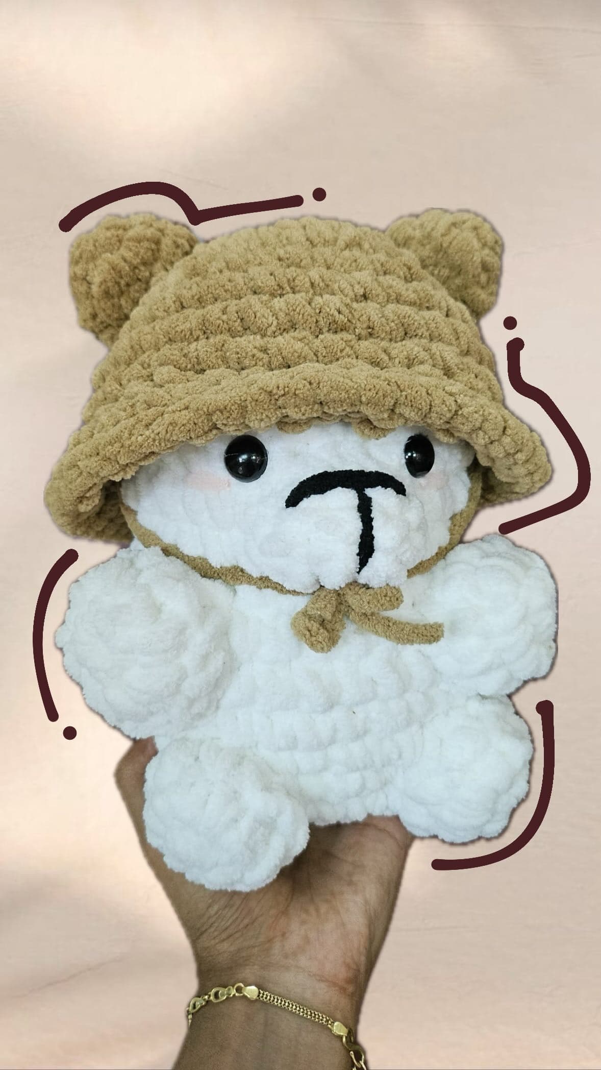 Crochet bear in a bucket hat